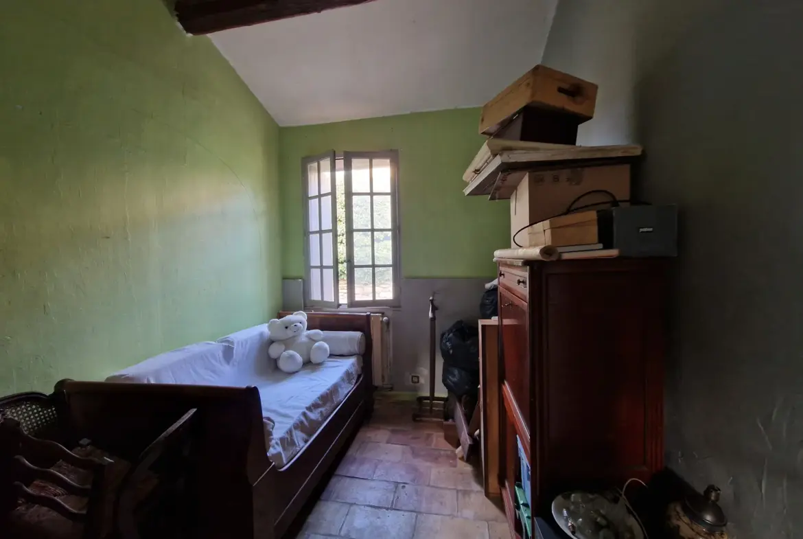 À vendre : Maison de village avec jardin à Aujargues 
