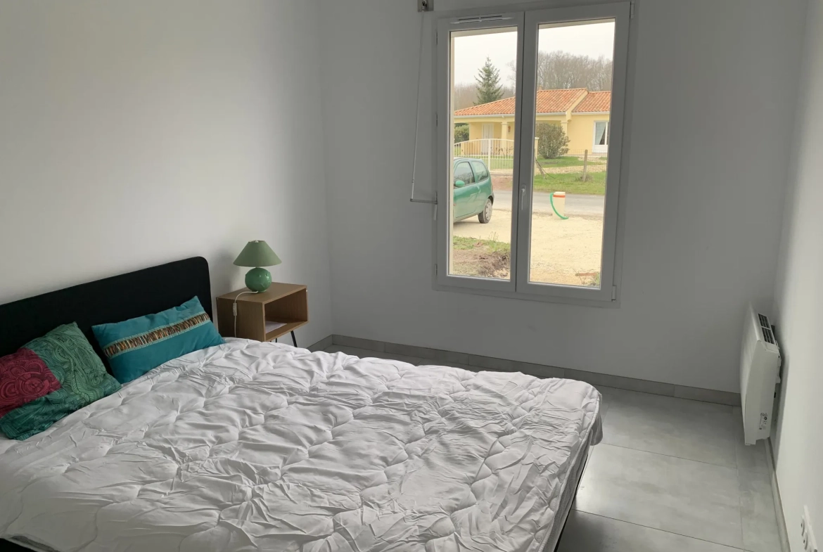 Maison rénovée avec jardin à Médis - 74,92 m², 2 chambres et parking 