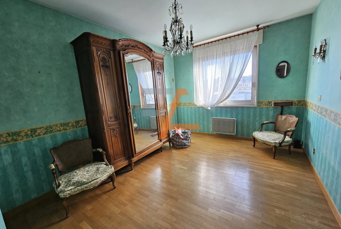 F3 de 76m² avec balcon, parking et ascenseur à Saint-Étienne 