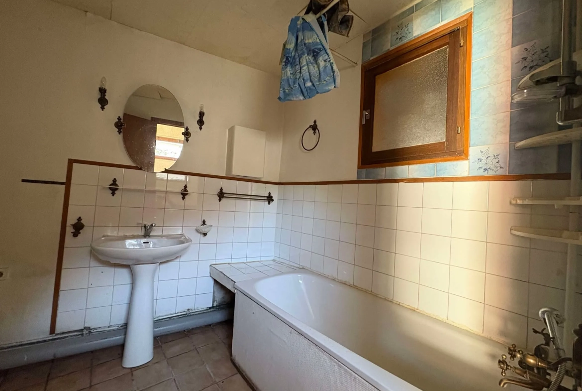 Maison à rénover à Pont-Remy - Opportunité d'investissement avec jardin 