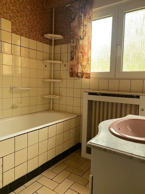 Appartement à vendre à Algrange – 4 chambres, jardin, garage, potentiel à saisir 