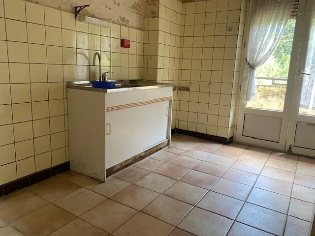 Appartement à vendre à Algrange – 4 chambres, jardin, garage, potentiel à saisir 