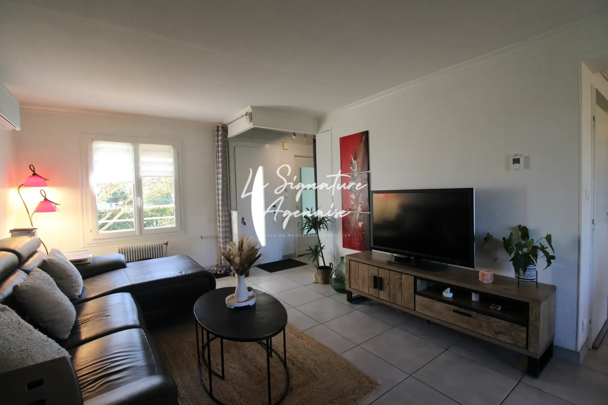 Maison de 105m² avec 3 chambres, jardin clos et rénovations récentes à Le Passage 