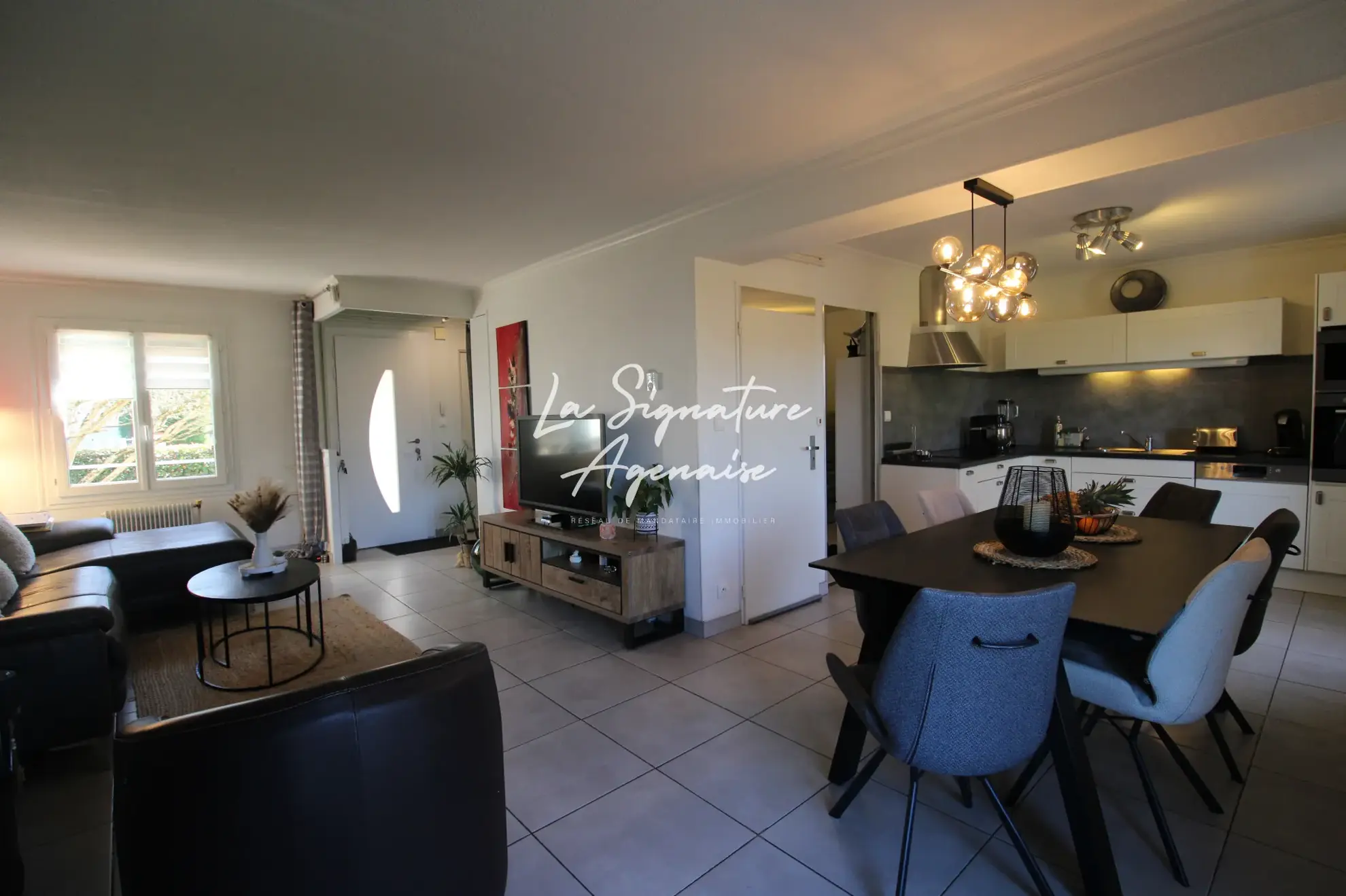 Maison de 105m² avec 3 chambres, jardin clos et rénovations récentes à Le Passage 
