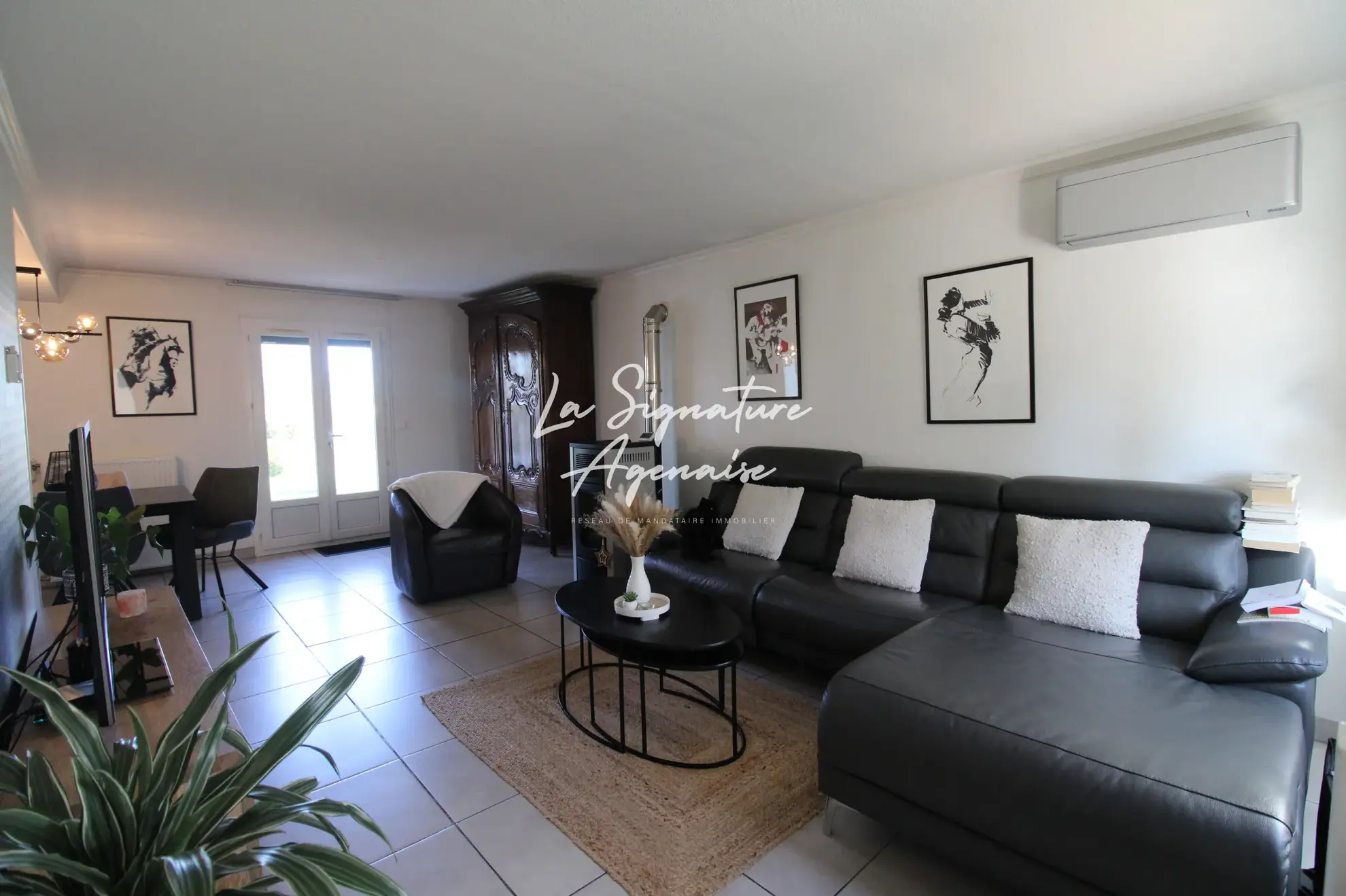 Maison de 105m² avec 3 chambres, jardin clos et rénovations récentes à Le Passage 