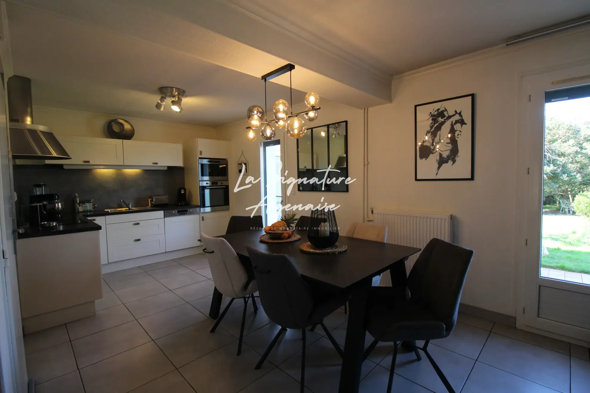 Maison de 105m² avec 3 chambres, jardin clos et rénovations récentes à Le Passage 