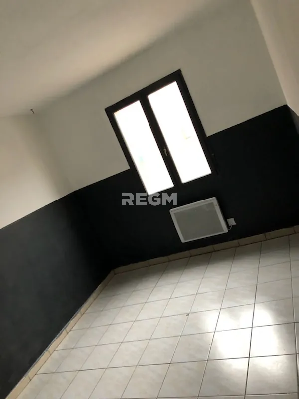 Maison de plain-pied à vendre à Evin-Malmaison avec 2 chambres et cour 