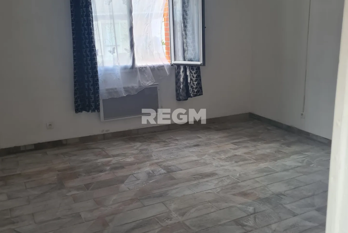 Maison de plain-pied à vendre à Evin-Malmaison avec 2 chambres et cour 