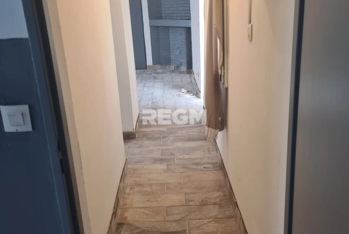Maison de plain-pied à vendre à Evin-Malmaison avec 2 chambres et cour 