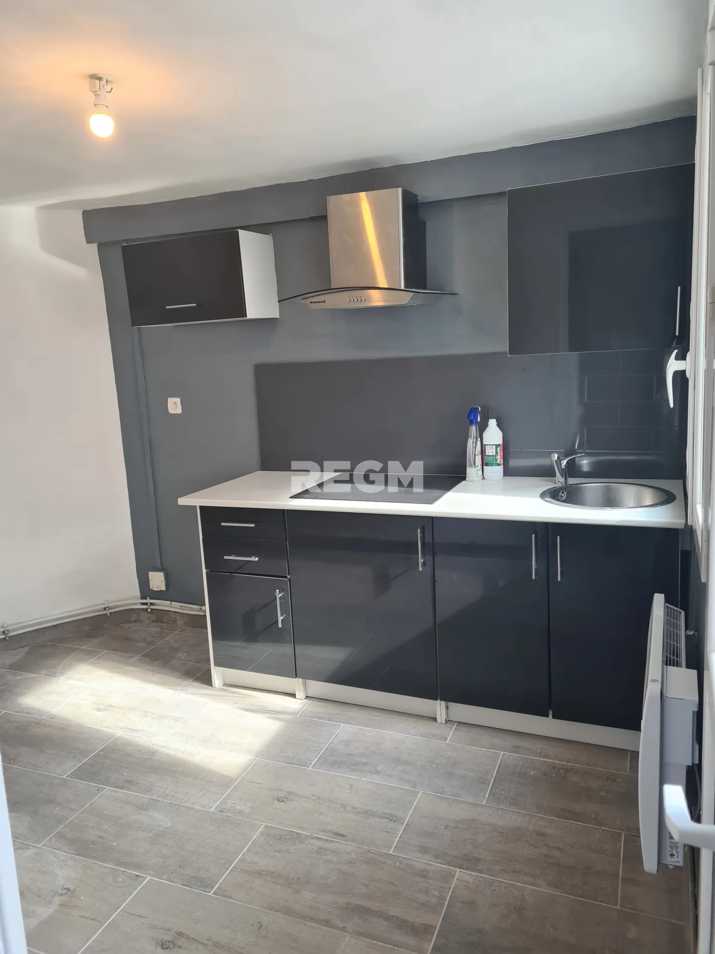 Maison de plain-pied à vendre à Evin-Malmaison avec 2 chambres et cour 
