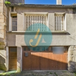Maison de village à rénover à Donzy avec grand garage et potentiel