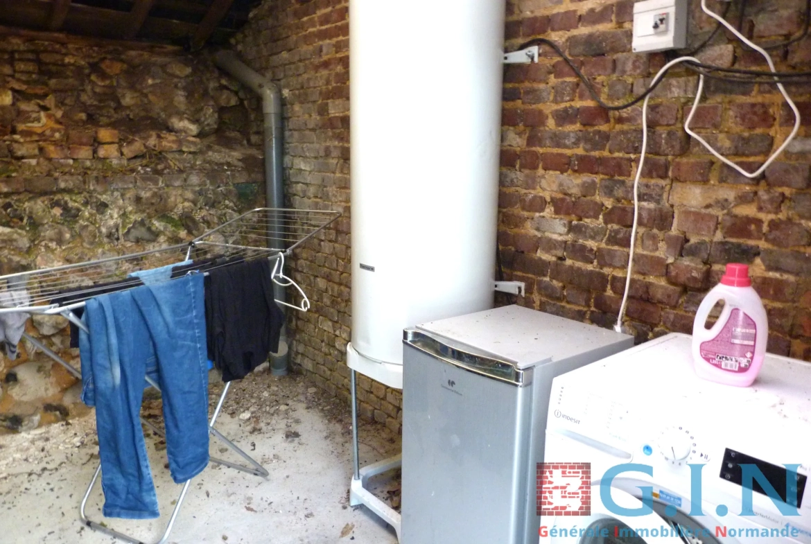 Maison à vendre à Rouen - 42m² rénovée avec dépendance et terrasse 