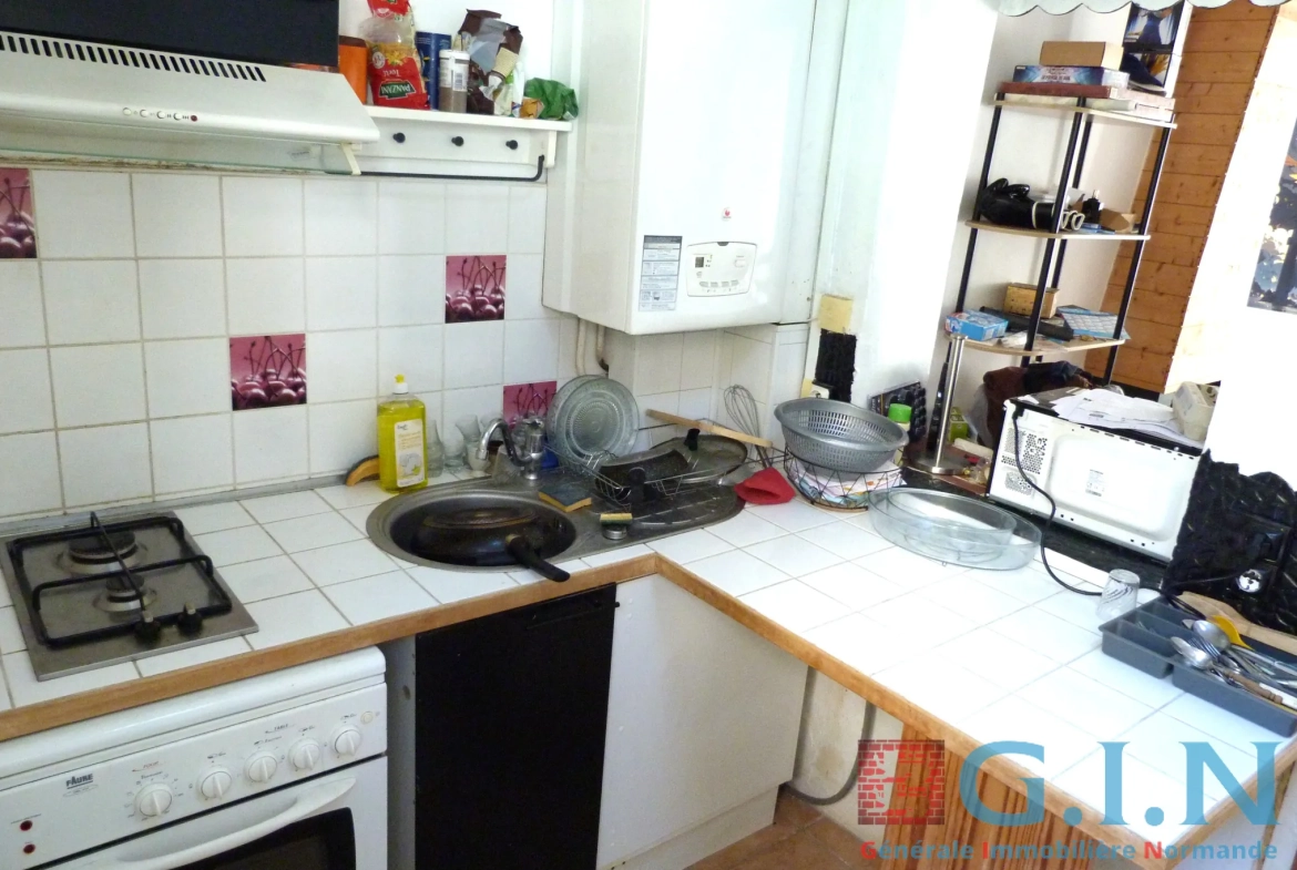 Maison à vendre à Rouen - 42m² rénovée avec dépendance et terrasse 