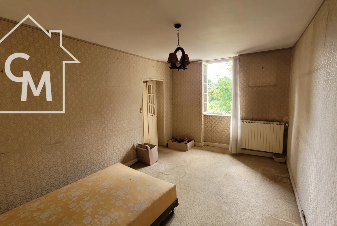 Maison spacieuse de 158 m² avec jardin, garage et dépendances à Pougues-les-Eaux 