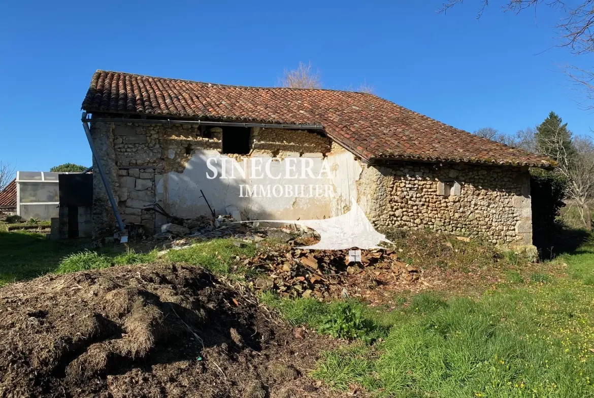 A vendre belle grange en pierre habitable avec terrain à Saint-Aquilin 24110 