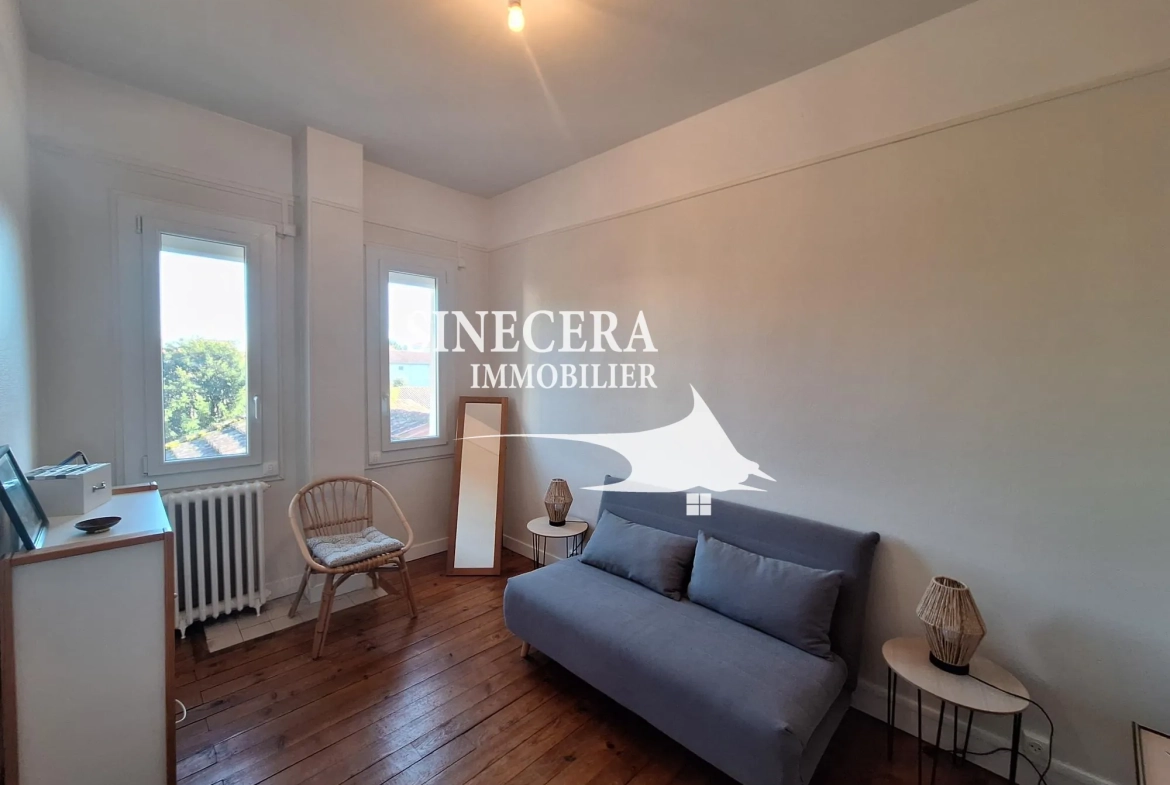 Maison de ville à Bergerac avec jardin, 3 chambres, idéale pour investissement locatif 