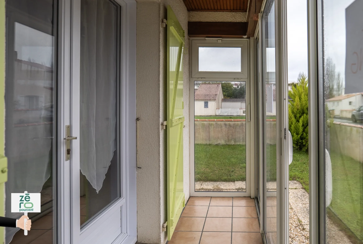 Charmant pavillon à vendre à L’Aiguillon, 2 chambres, véranda, garage et terrain clos en Vendée 