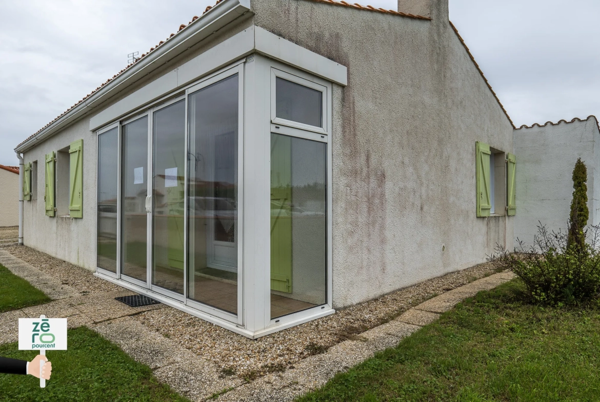 Charmant pavillon à vendre à L’Aiguillon, 2 chambres, véranda, garage et terrain clos en Vendée 