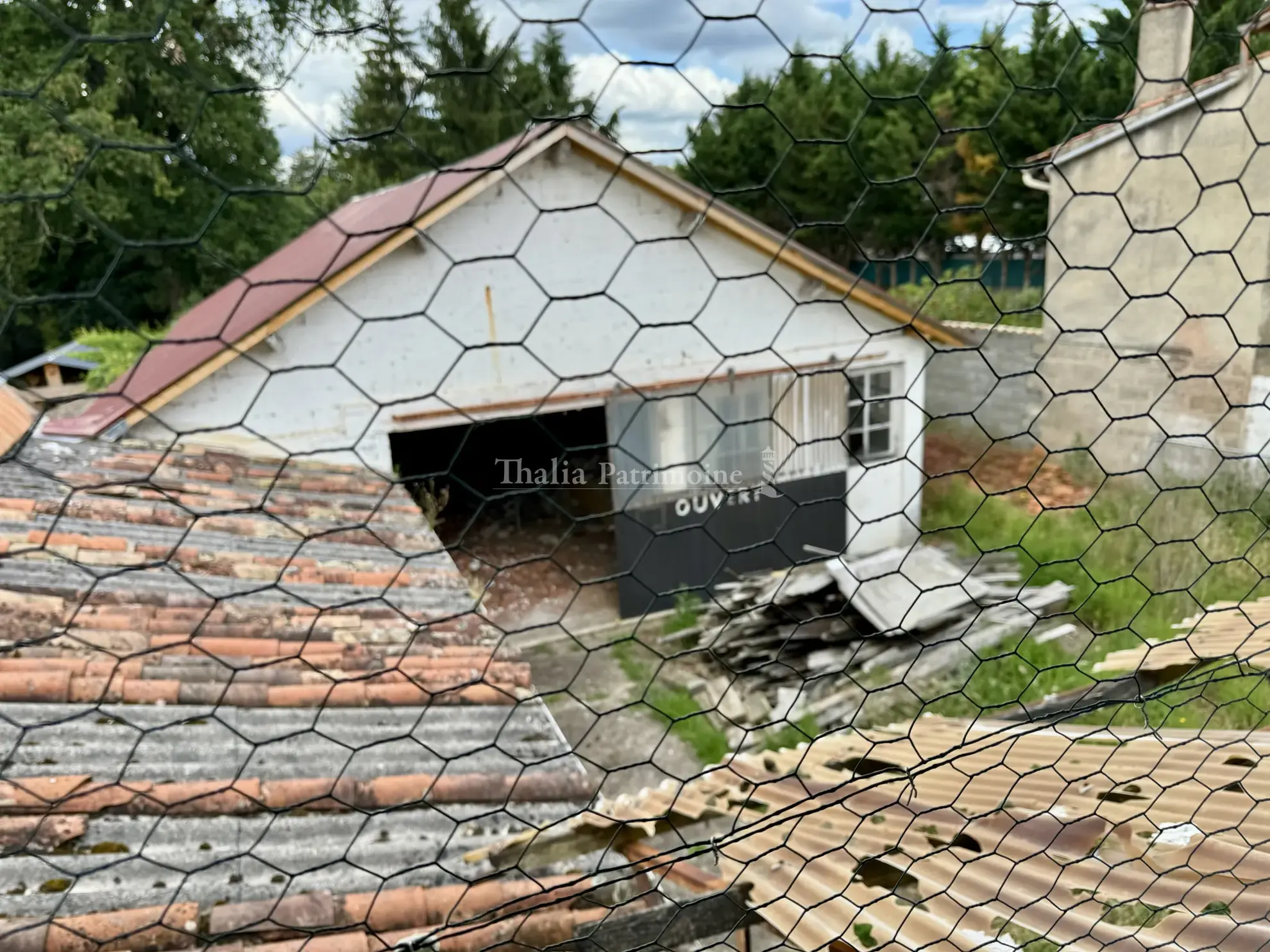 Immeuble de rapport à vendre à Bergerac avec parking et grand jardin 