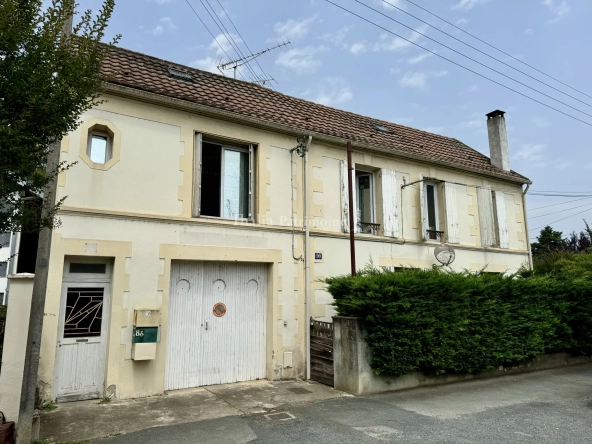 Immeuble de rapport à vendre à Bergerac avec parking et grand jardin