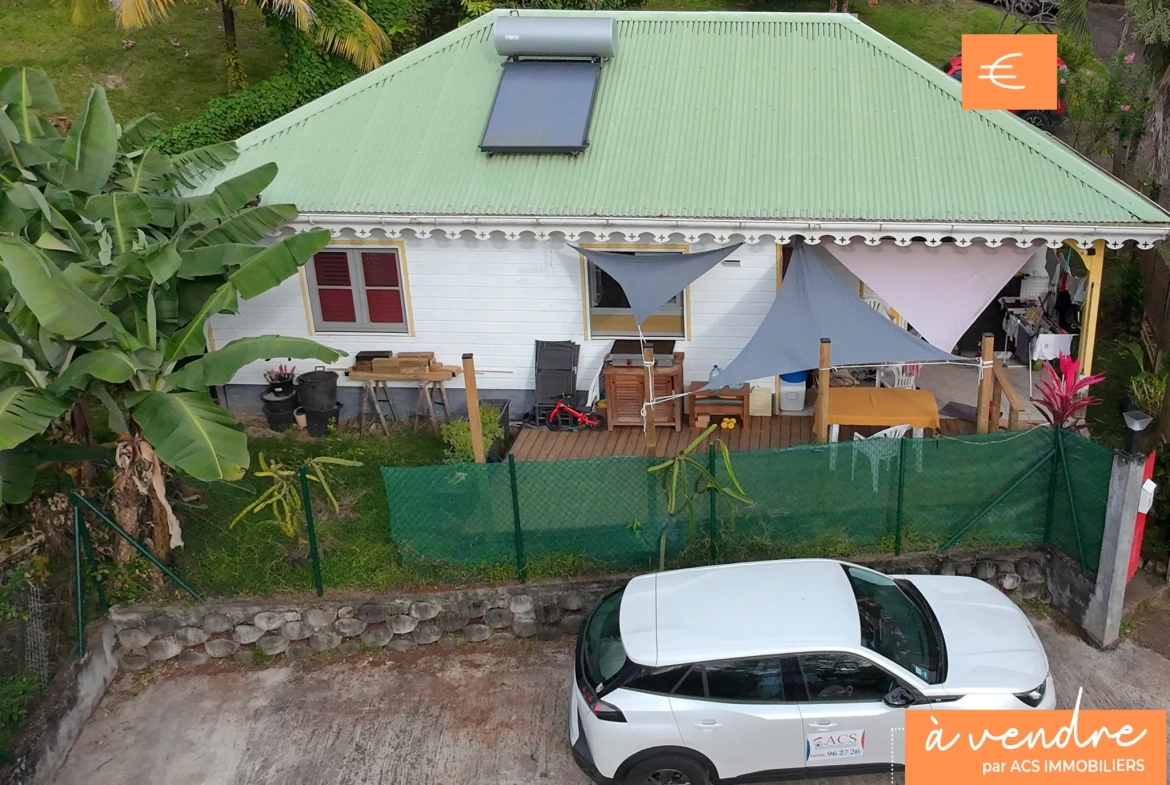A vendre maison F3 en bois à Ducos, quartier calme, jardin, disponible en 2025 