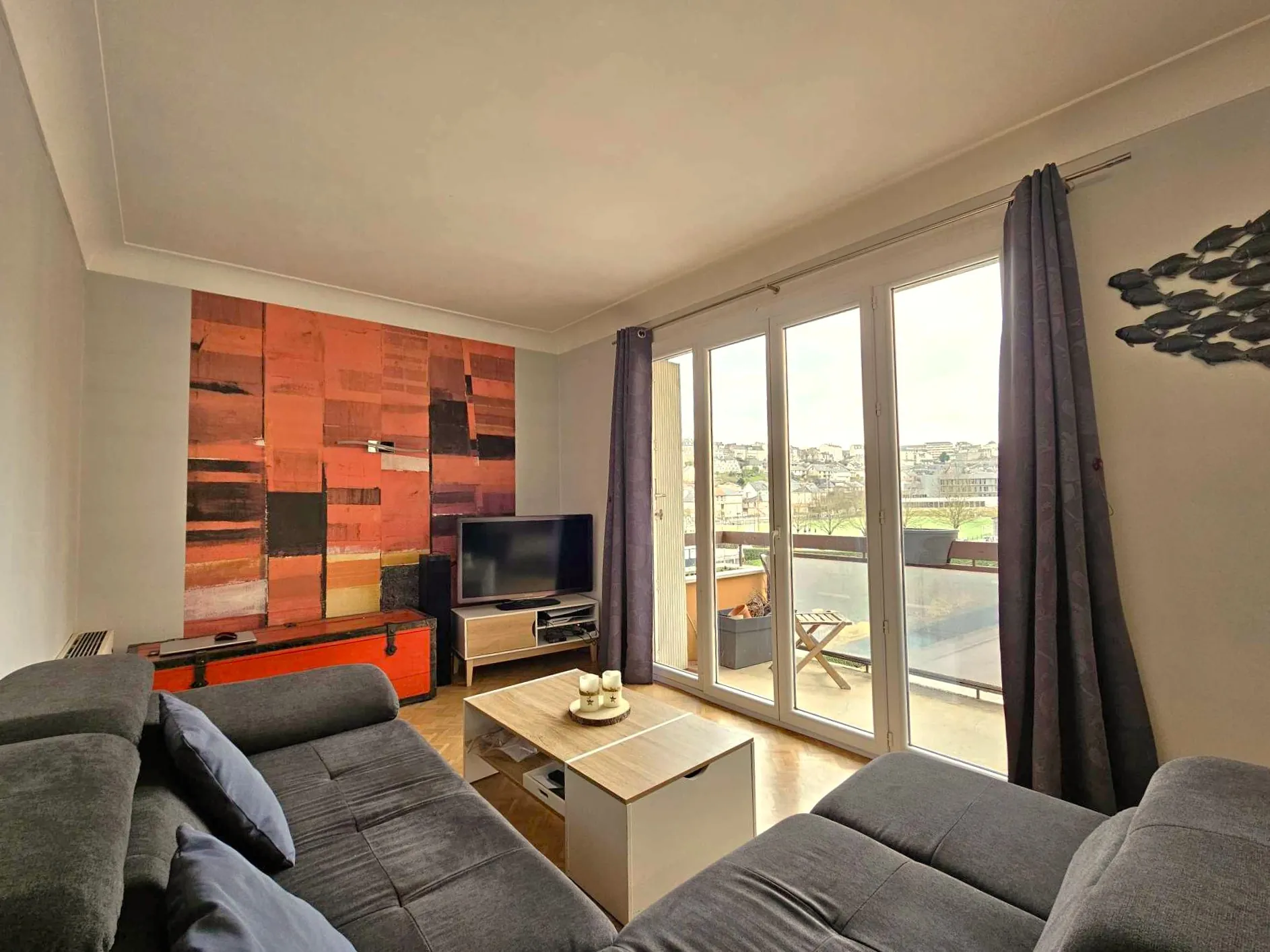 Spacieux appartement T3 de 93 m² à Rodez avec balcon, garage et proximité commodités 