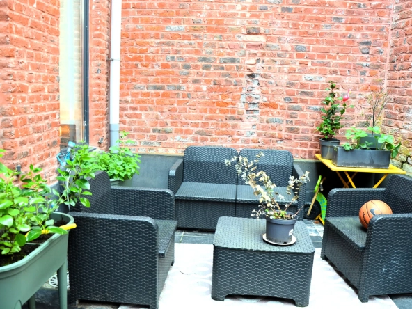 Maison rénovée avec 3 chambres, cour et confort moderne à Tourcoing