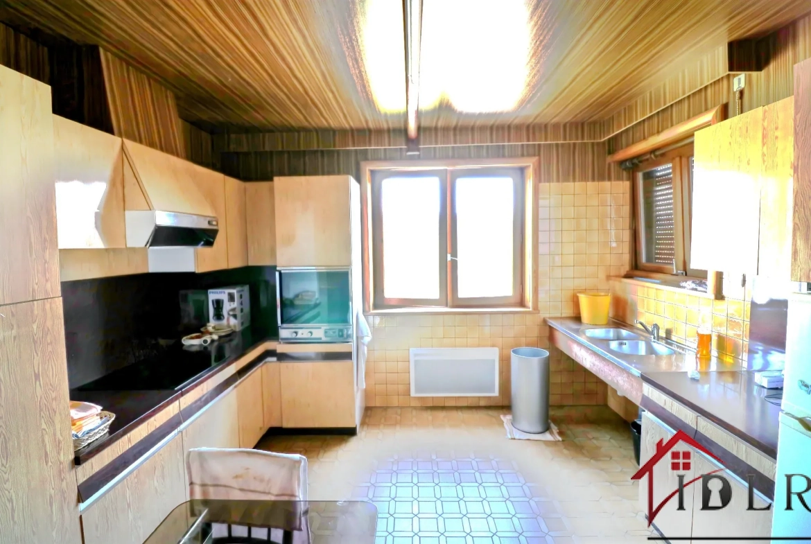 Maison familiale de 124 m² avec terrain arboré à Brouvelieures - Vue, proximité Épinal et Saint-Dié 