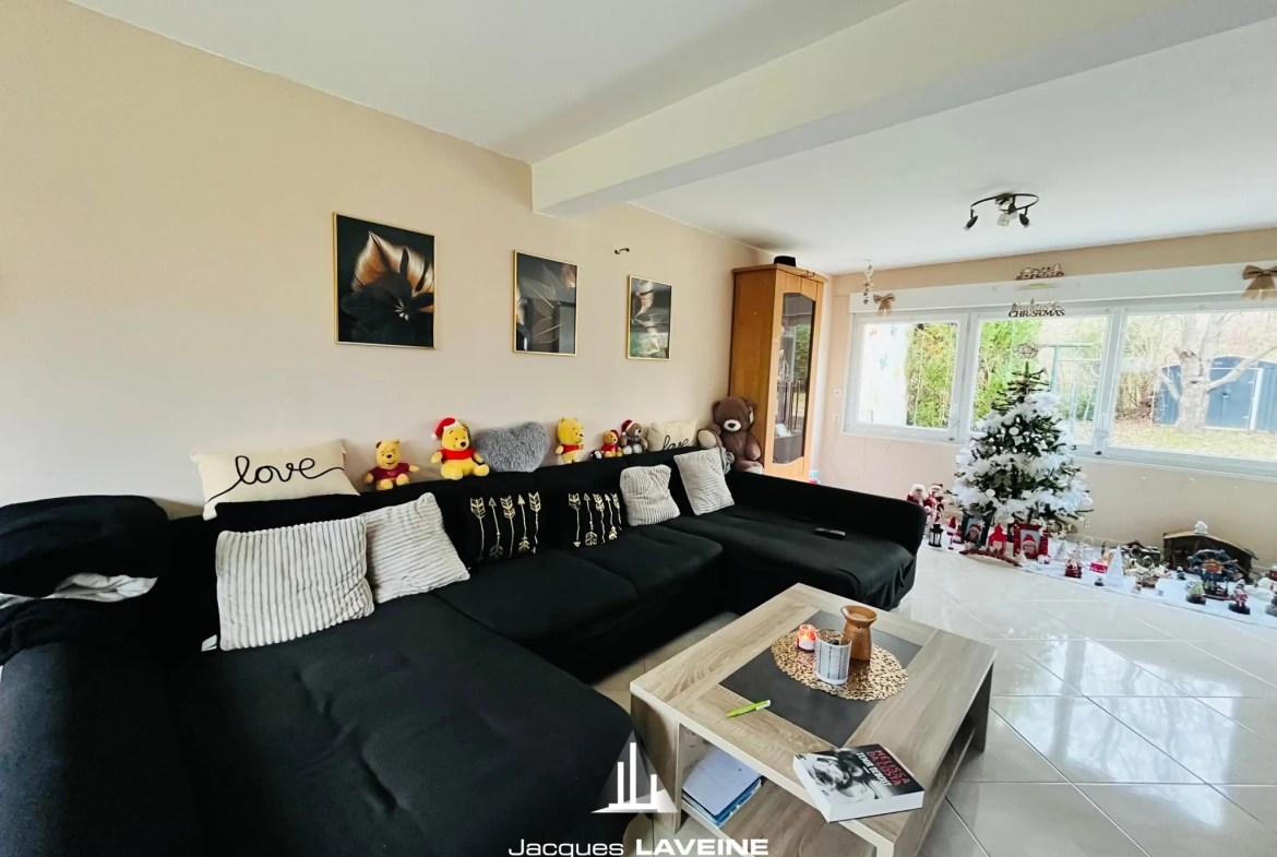 Maison à vendre à Metz avec 4 chambres, jardin et garage - Idéal investissement 