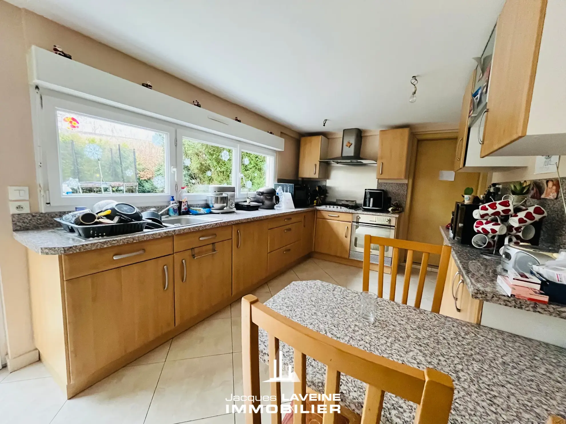 Maison à vendre à Metz avec 4 chambres, jardin et garage - Idéal investissement 