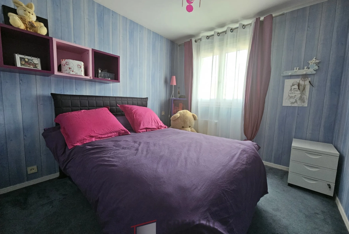 Maison familiale à Clermont-Ferrand avec jardin et garage - 110 m² 