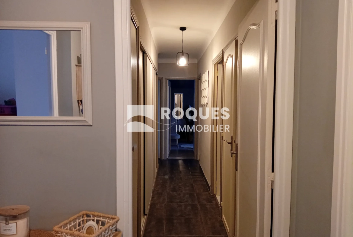 Bel appartement T4 à Millau avec balcon, cave et parking, proche des berges du Tarn 