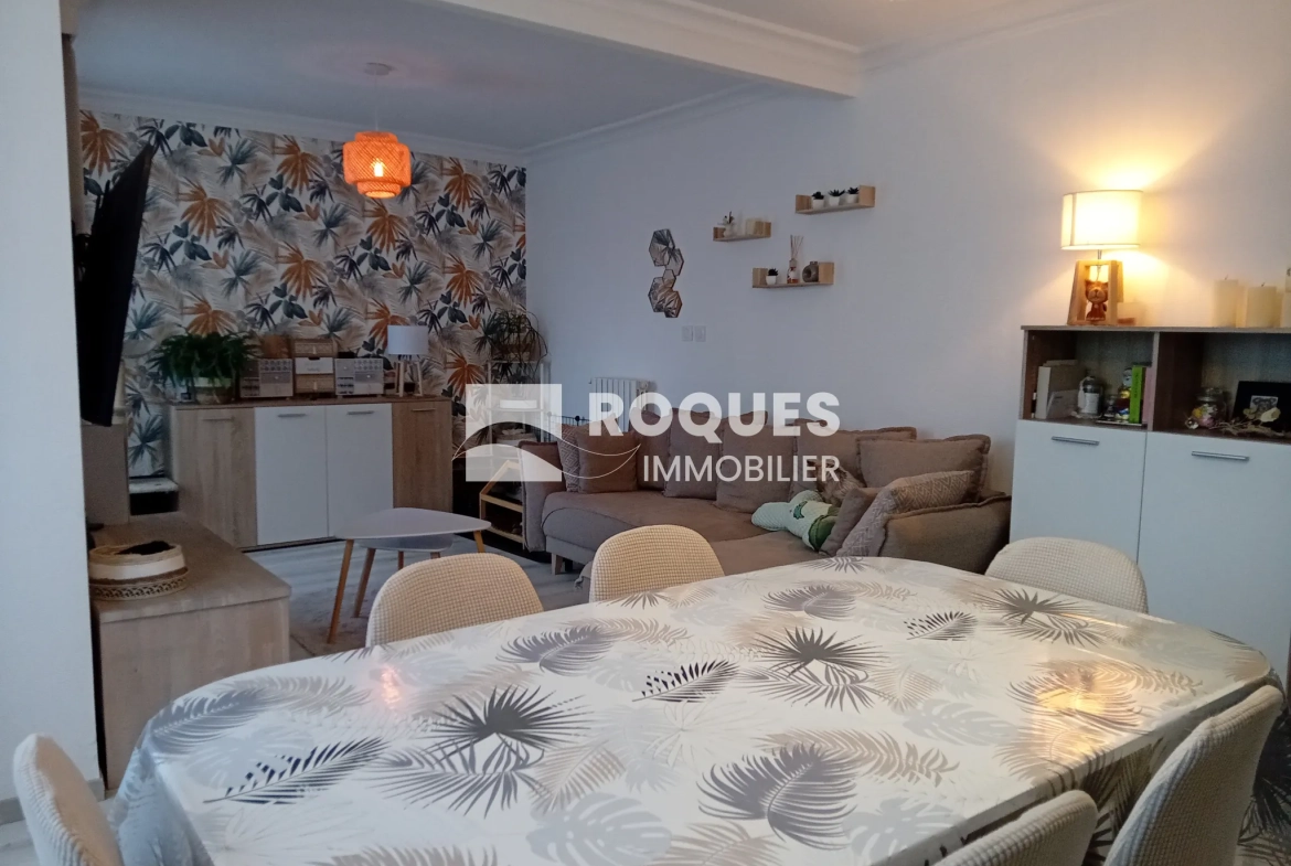 Bel appartement T4 à Millau avec balcon, cave et parking, proche des berges du Tarn 