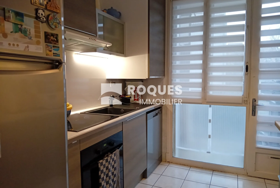 Bel appartement T4 à Millau avec balcon, cave et parking, proche des berges du Tarn 