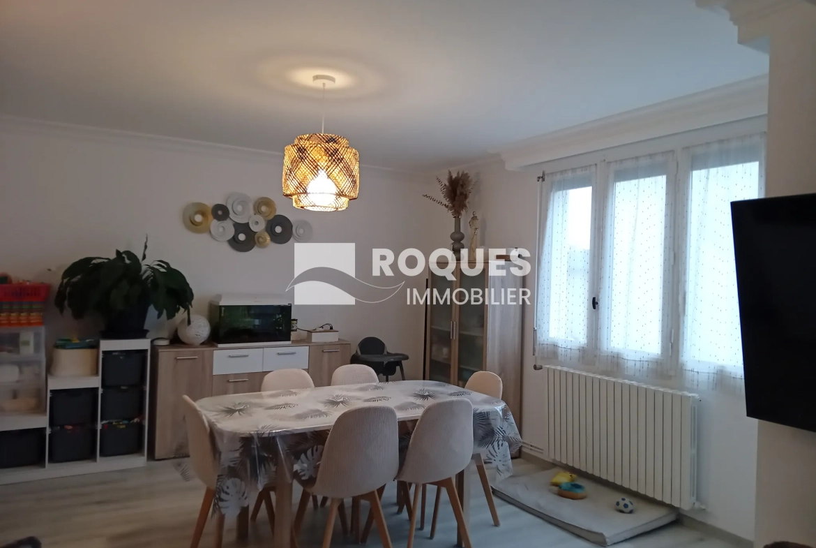 Bel appartement T4 à Millau avec balcon, cave et parking, proche des berges du Tarn 