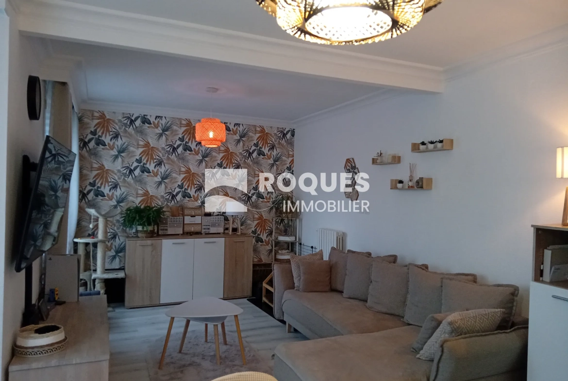 Bel appartement T4 à Millau avec balcon, cave et parking, proche des berges du Tarn 
