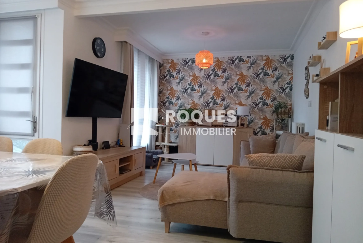 Bel appartement T4 à Millau avec balcon, cave et parking, proche des berges du Tarn 
