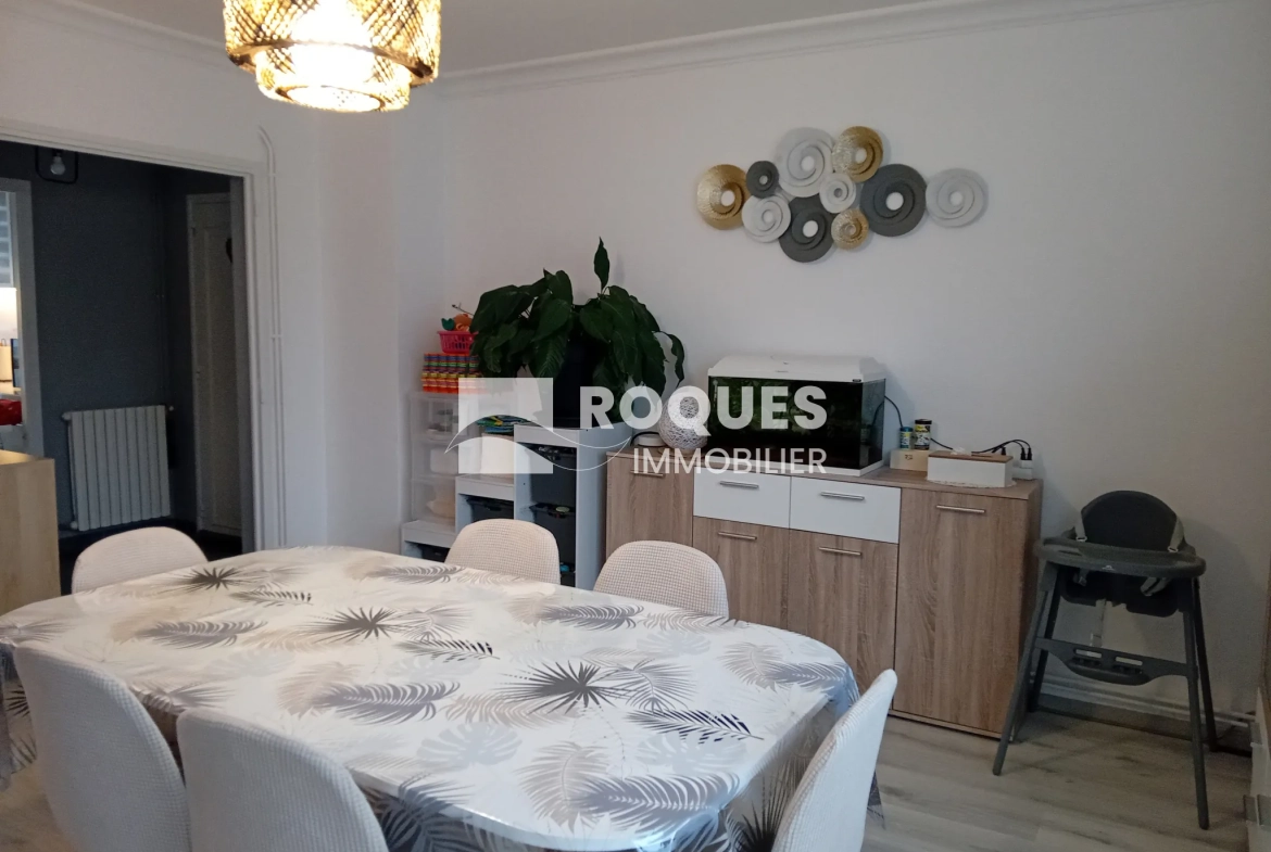 Bel appartement T4 à Millau avec balcon, cave et parking, proche des berges du Tarn 