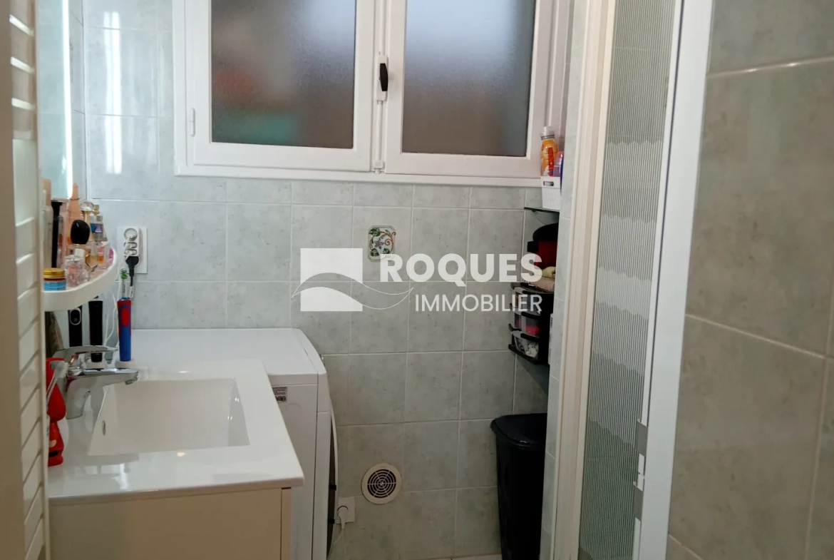 Bel appartement T4 à Millau avec balcon, cave et parking, proche des berges du Tarn 