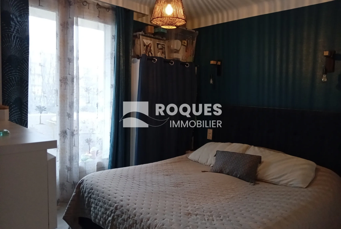 Bel appartement T4 à Millau avec balcon, cave et parking, proche des berges du Tarn 