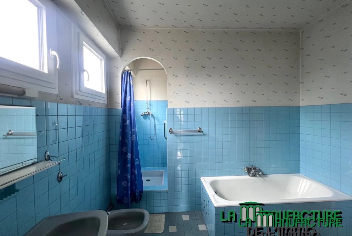 Appartement F5 lumineux avec balcons, cave et garage à Saint-Étienne Montieau 