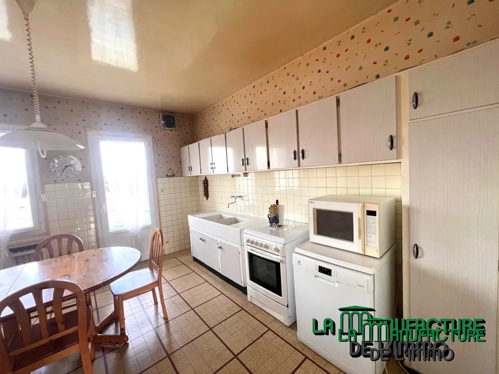 Appartement F5 lumineux avec balcons, cave et garage à Saint-Étienne Montieau 