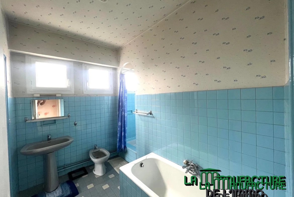 Appartement F5 lumineux avec balcons, cave et garage à Saint-Étienne Montieau 