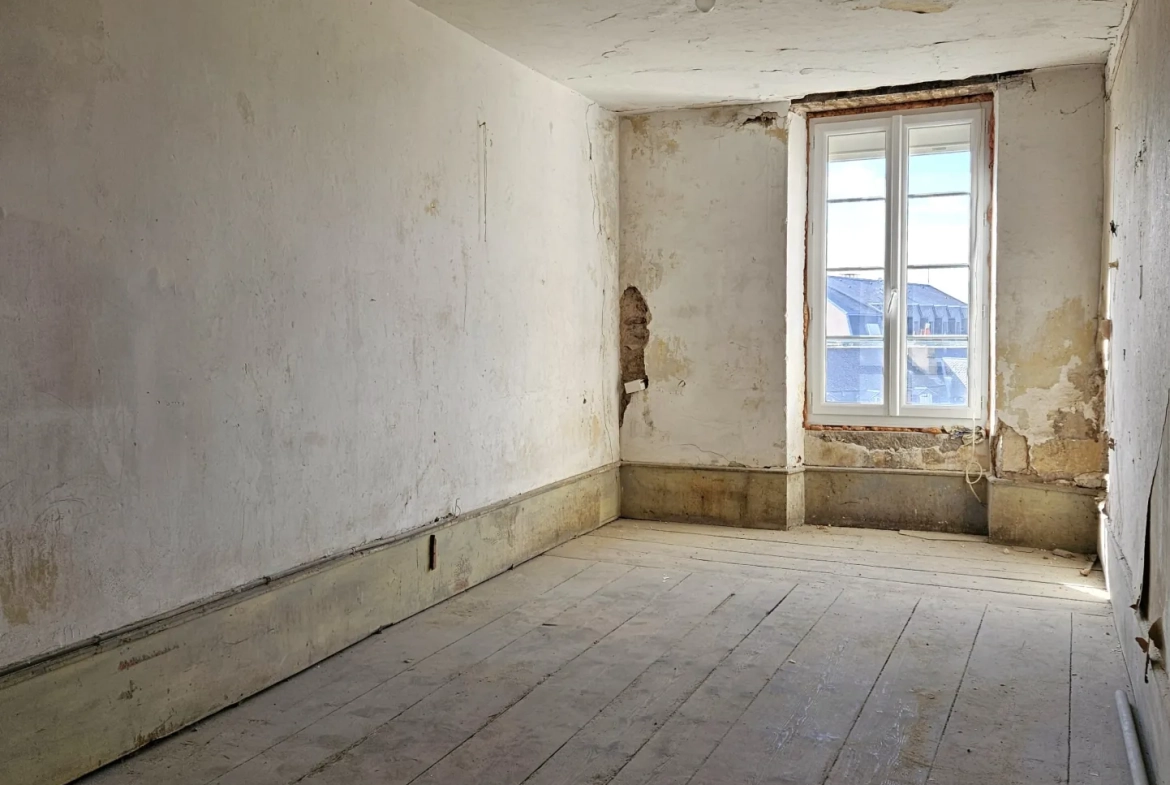Appartement à rénover de 88 m² au centre de Rodez avec fort potentiel 