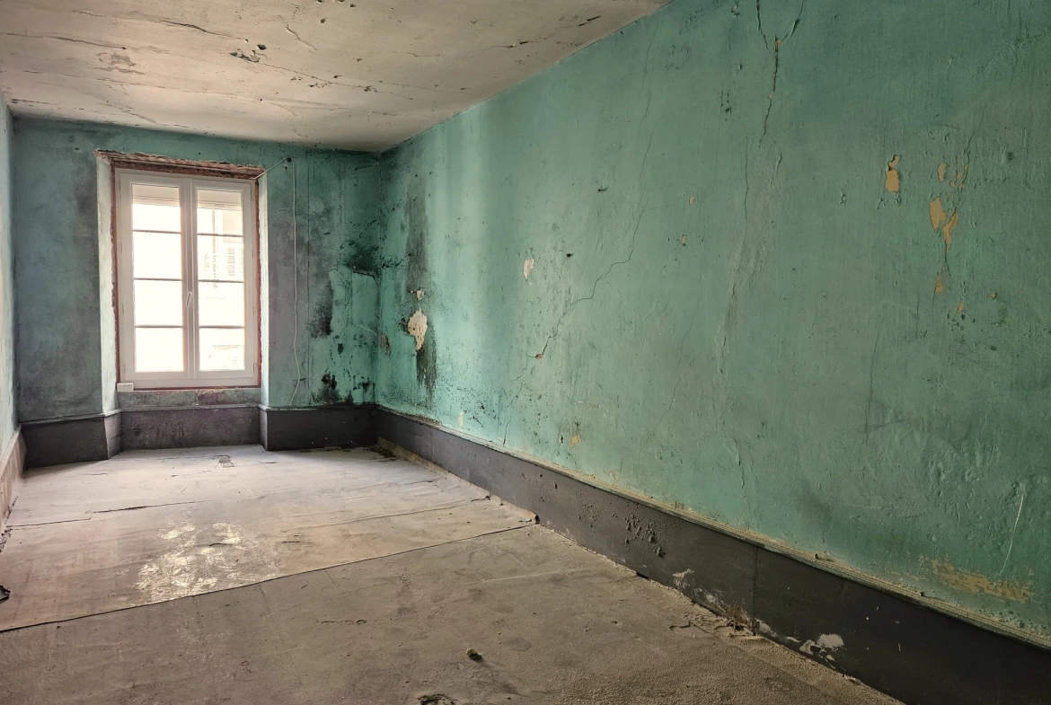 Appartement à rénover de 88 m² au centre de Rodez avec fort potentiel 