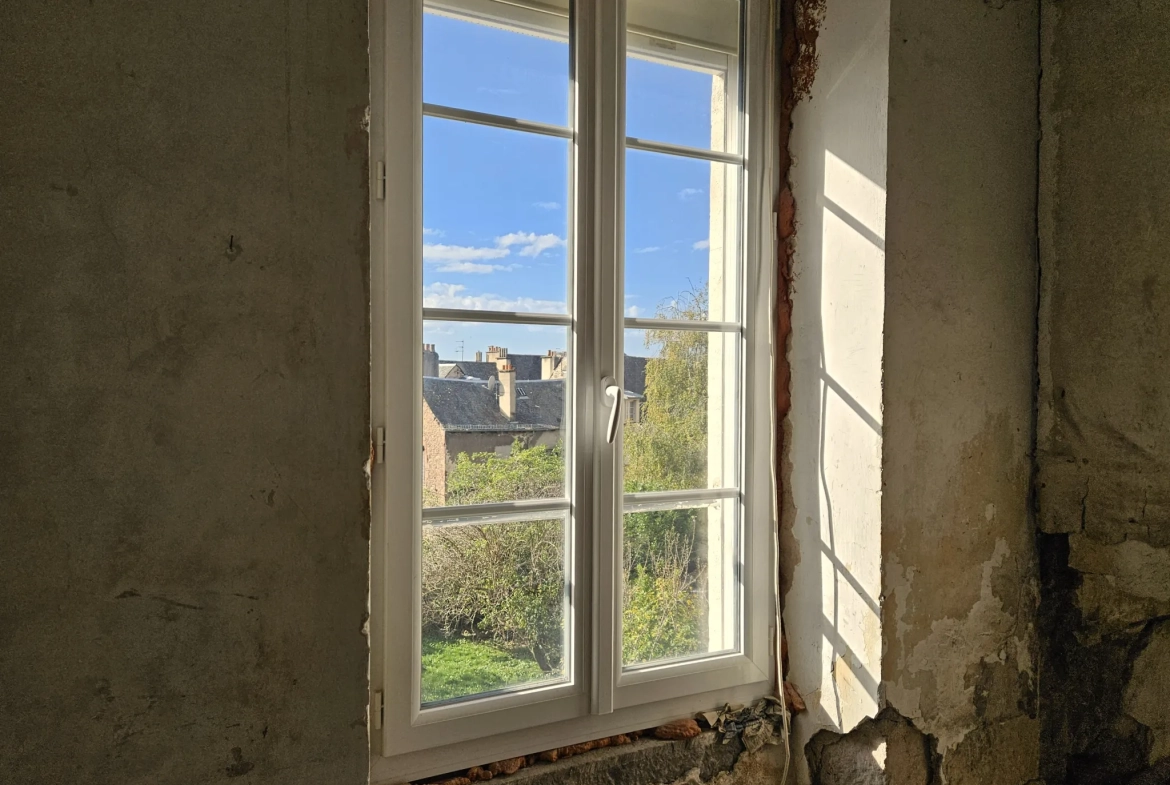 Appartement à rénover de 88 m² au centre de Rodez avec fort potentiel 
