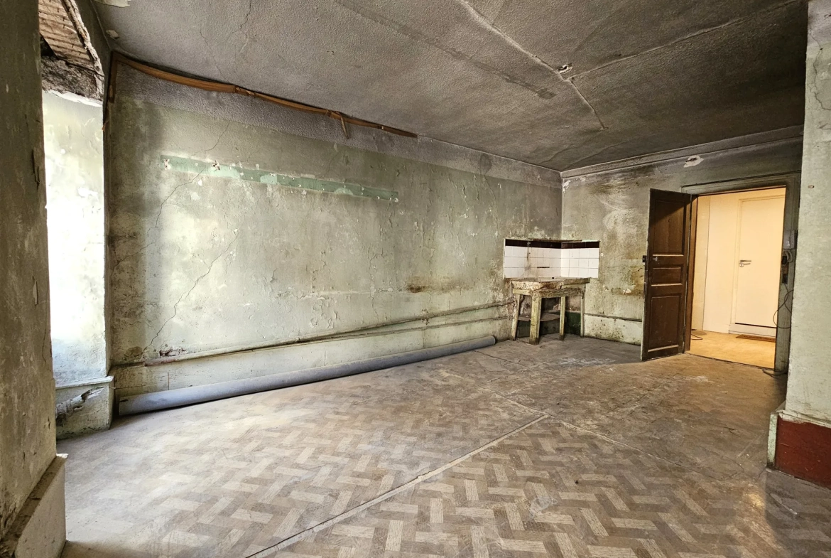 Appartement à rénover de 88 m² au centre de Rodez avec fort potentiel 