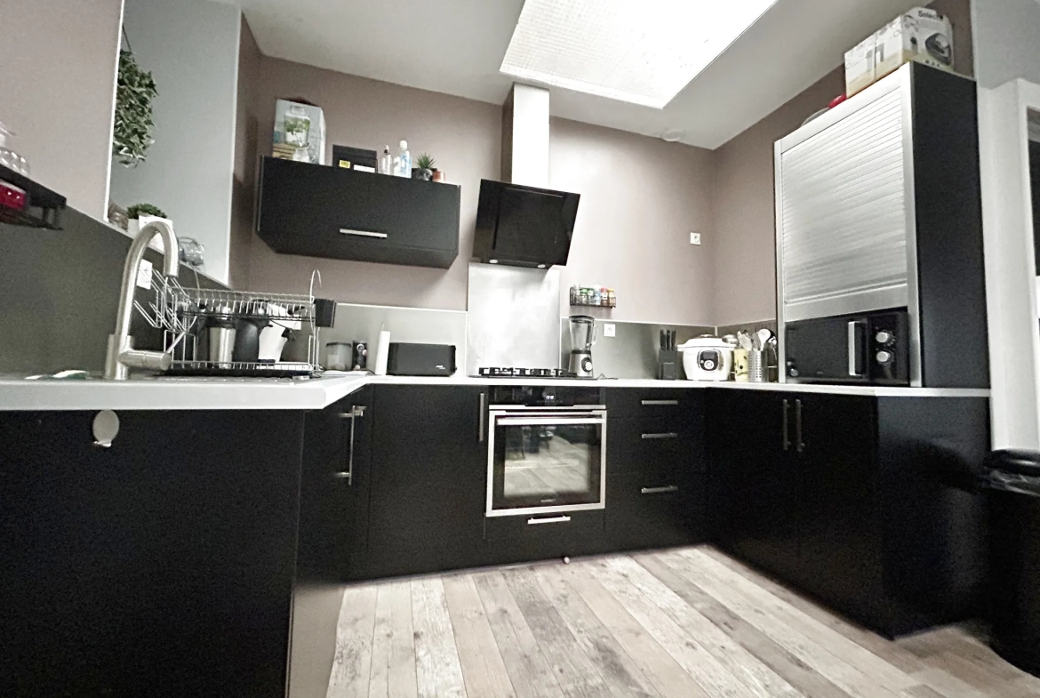 Maison semi-individuelle à Hénin Beaumont avec garage et jardin – Bonne affaire 