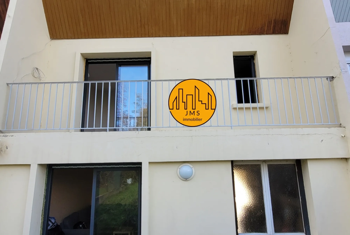 Maison mitoyenne à Yzeure avec jardin, garage et potentiel d'extension 