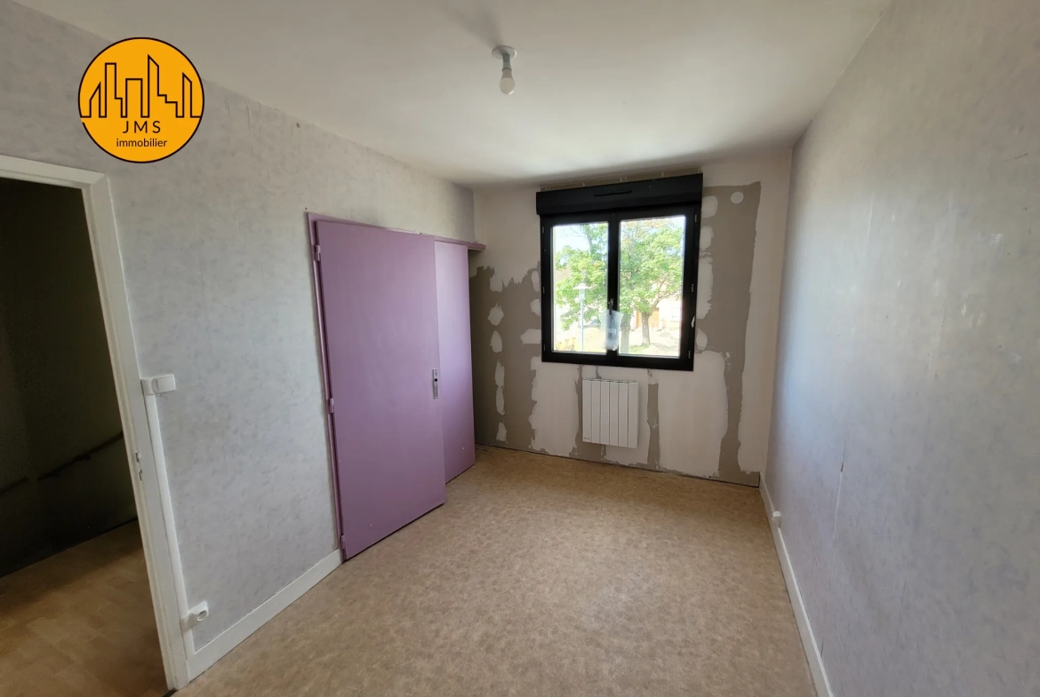 Maison mitoyenne à Yzeure avec jardin, garage et potentiel d'extension 